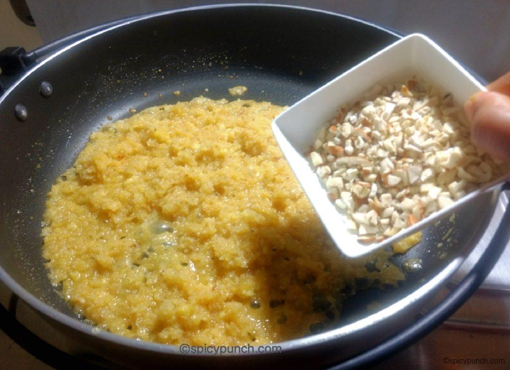 adding chopped dry fruits to coconut stuffing