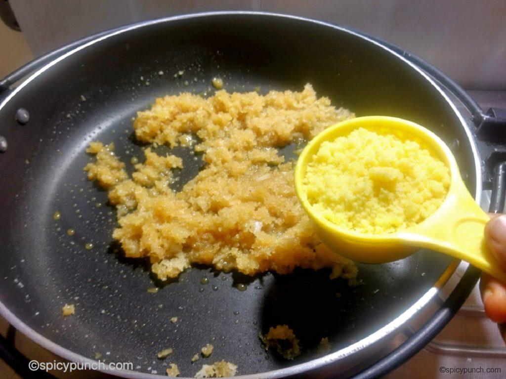 adding khoya to coconut stuffing