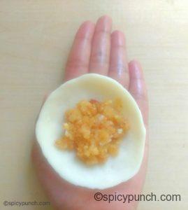 dough bowl with coconut stuffing for making modak