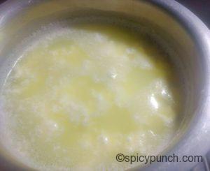 milk is curdled and slight greenish whey is visible