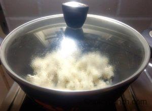 rice dough is kept in the pan before kneading