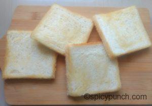 greased bread slices with butter