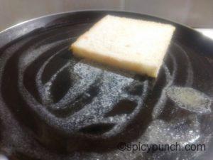 put the bread slice on the melted butter