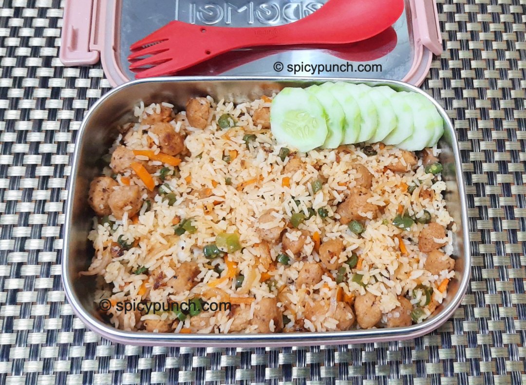Soya chunks rice recipe for kids lunch box in 10 -15 mins packed in a steel tiffin box in the picture